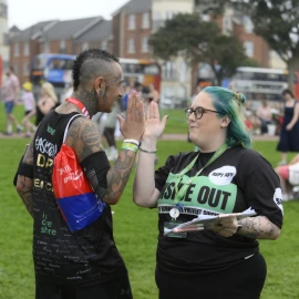 Two runners high fiving during the Great North Run